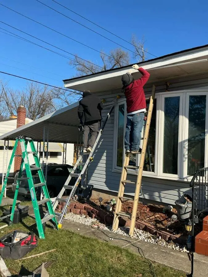 Restoration crew performing exterior repair in Franklin Town